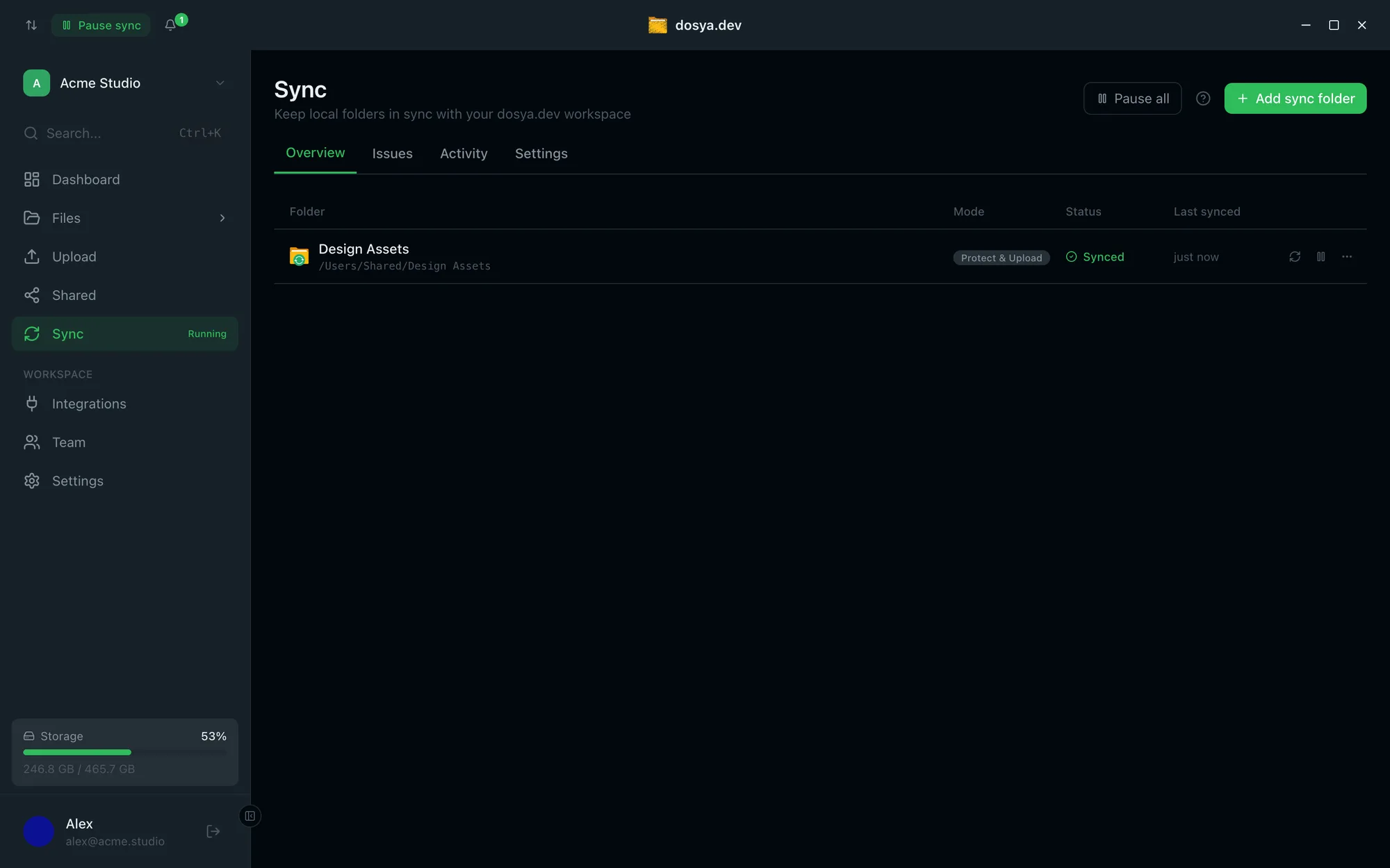 The desktop app's Sync view in dark mode: a local folder paired to a workspace, mode Protect and Upload, status Synced